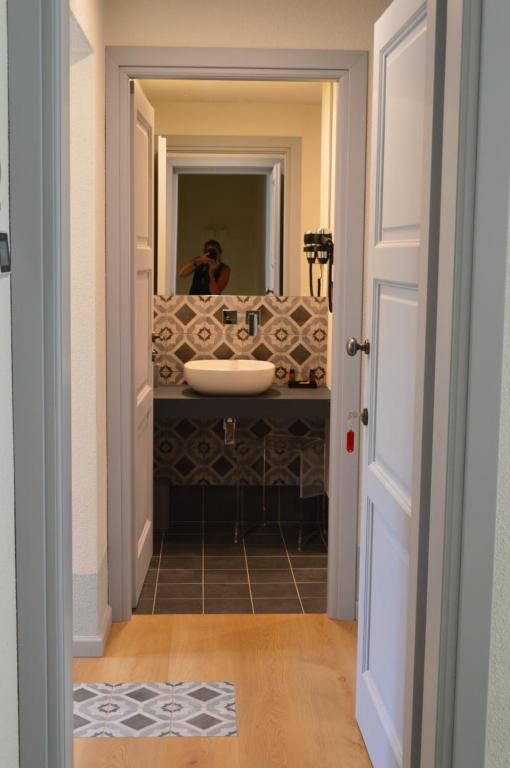 Postel nebo postele na pokoji v ubytování TANIT ROOMS & SPA
