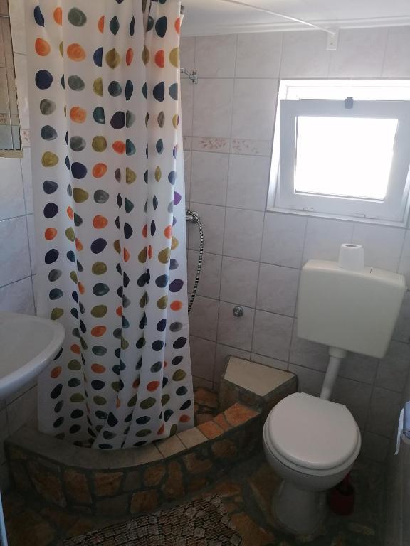 Kúpeľňa v ubytovaní Apartmani Marija i Josip