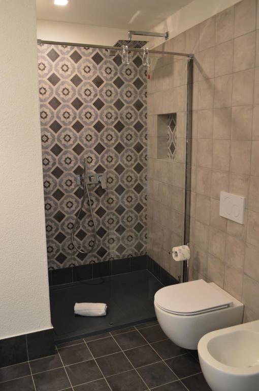 Koupelna v ubytování TANIT ROOMS & SPA