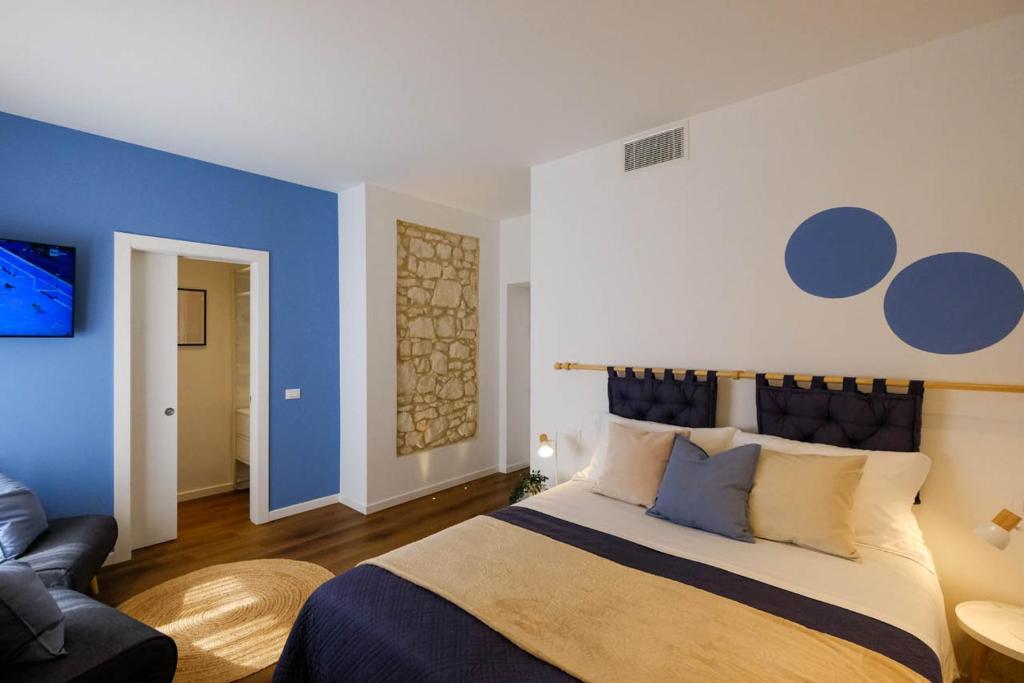 Ένα ή περισσότερα κρεβάτια σε δωμάτιο στο Verona Sweet Rooms - Affitti Brevi Italia