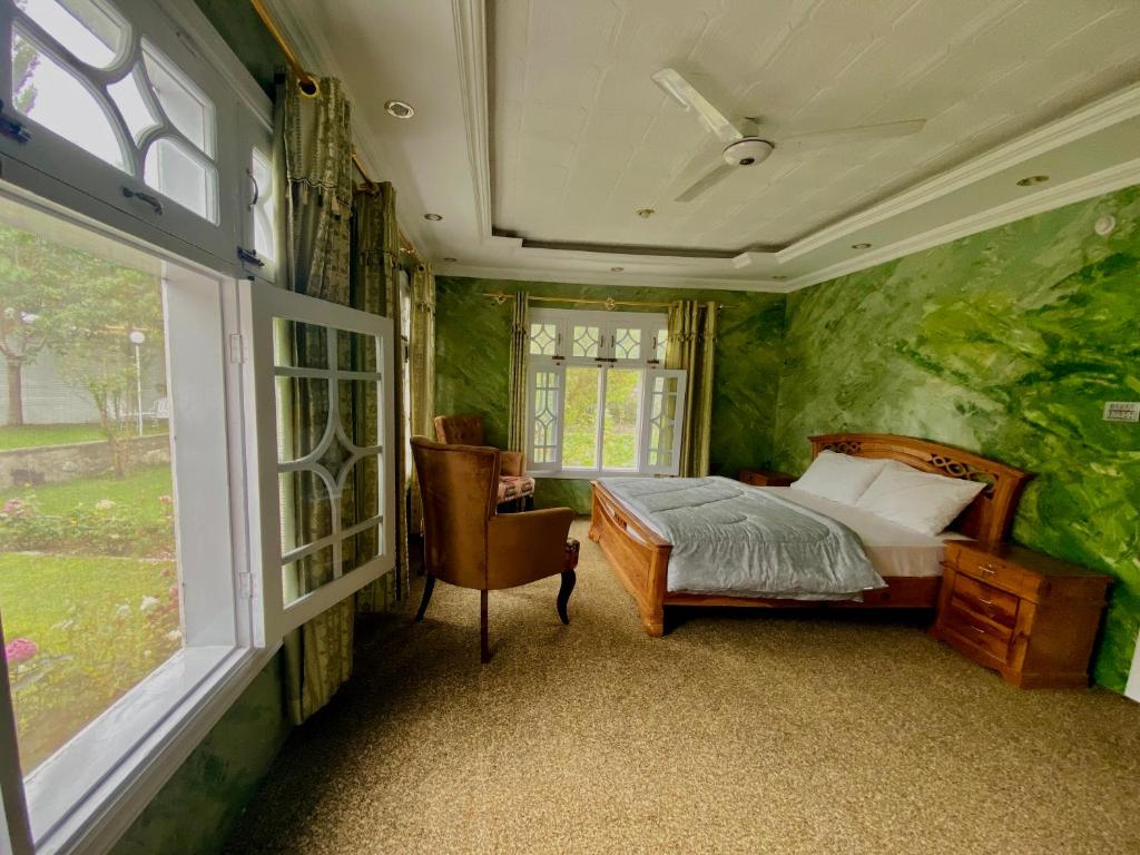 Postel nebo postele na pokoji v ubytování Taaj Residence Skardu