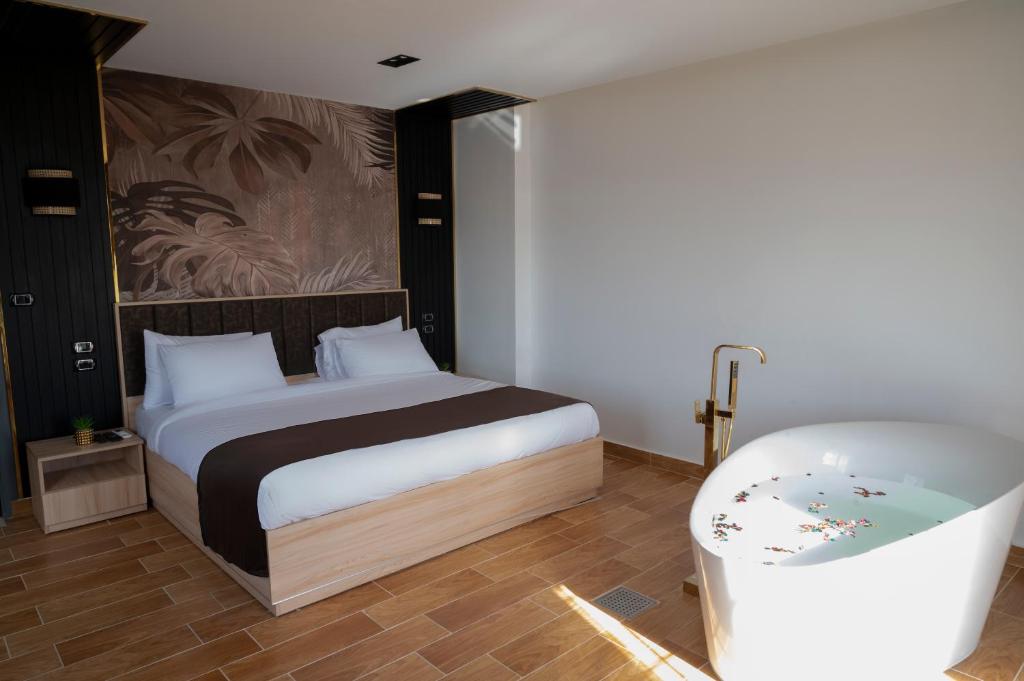 Letto o letti in una camera di Palm Pyramids View INN
