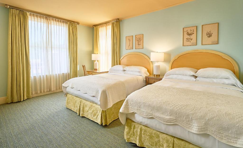 Postel nebo postele na pokoji v ubytování Ashland Springs Hotel