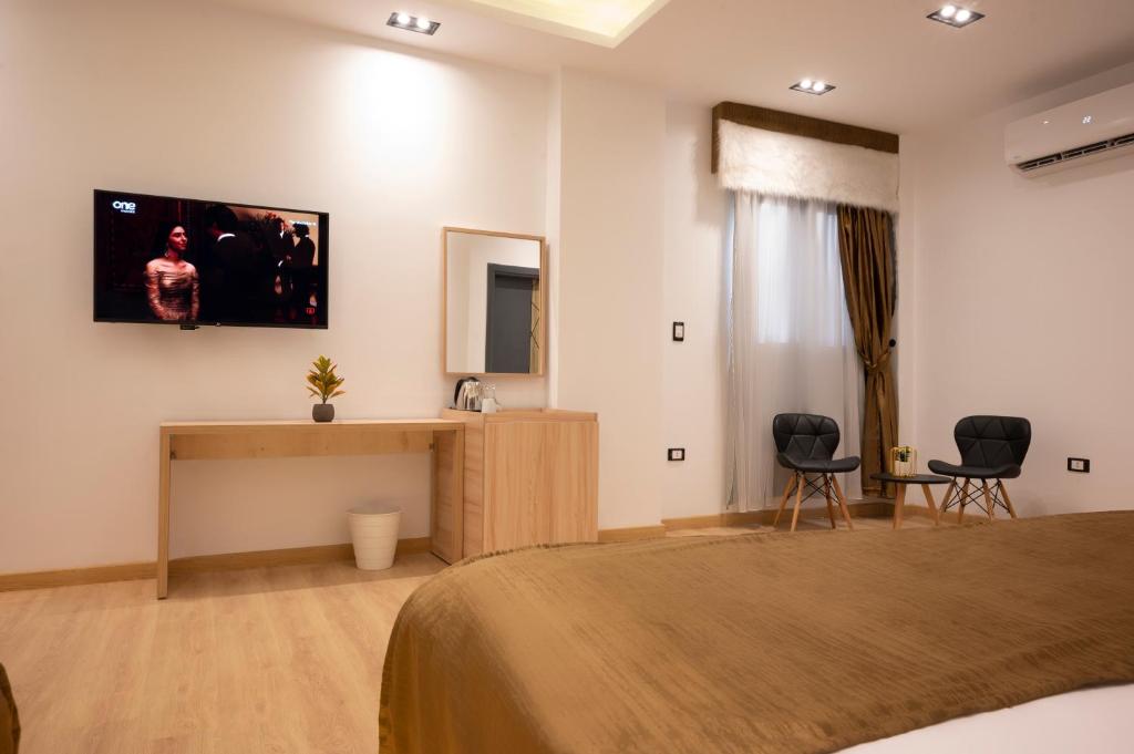 TV o dispositivi per l'intrattenimento presso Palm Pyramids View INN