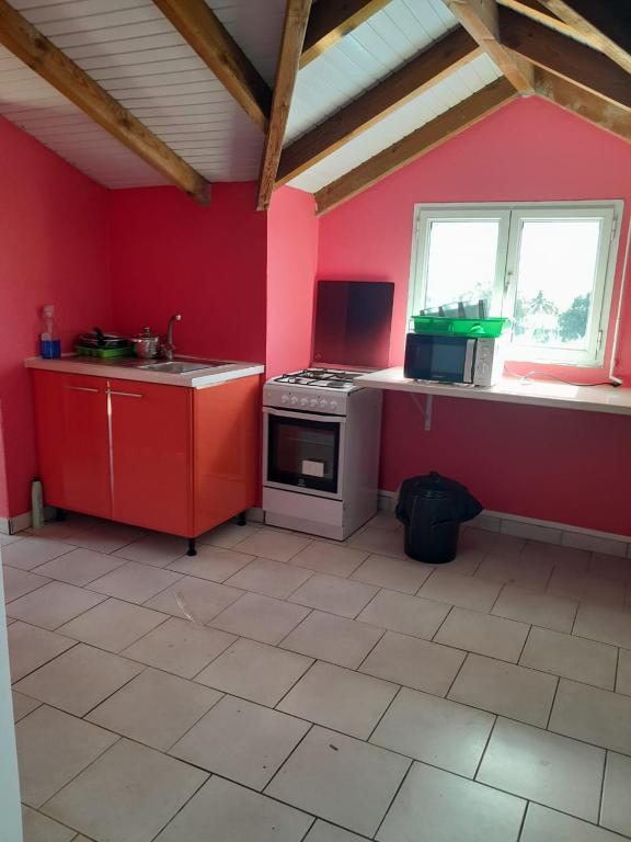 Kuchyň nebo kuchyňský kout v ubytování Le Paradis