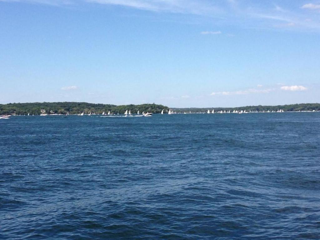 a large body of water with boats in the distance at Early check in- late check out Free day! in Lake Geneva