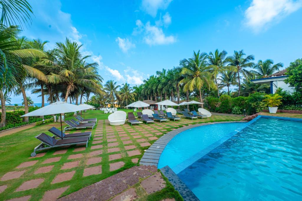 Bazén v ubytování O Hotel Goa, Candolim Beach nebo v jeho okolí