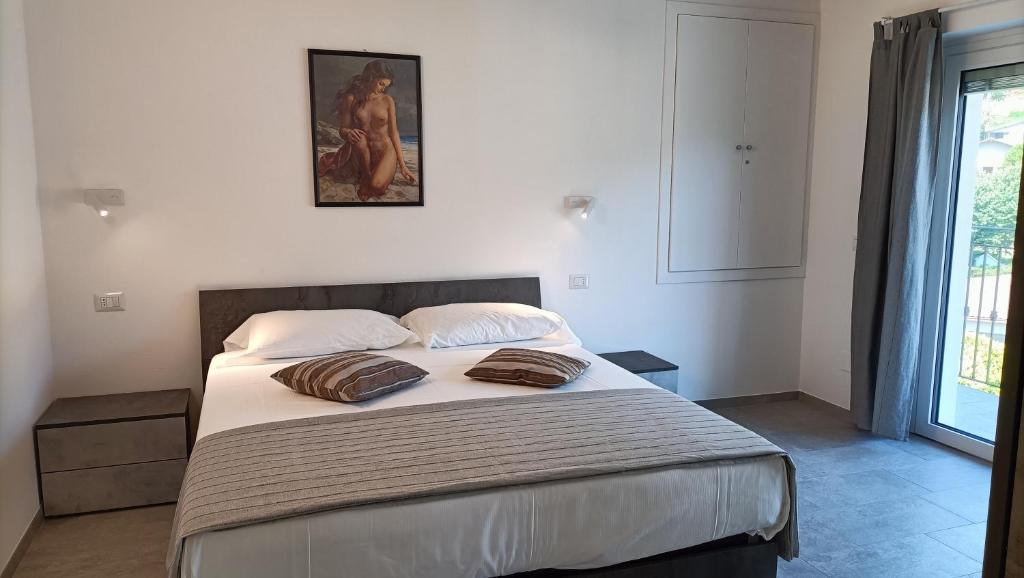 Postel nebo postele na pokoji v ubytování Calle - Larihome A37