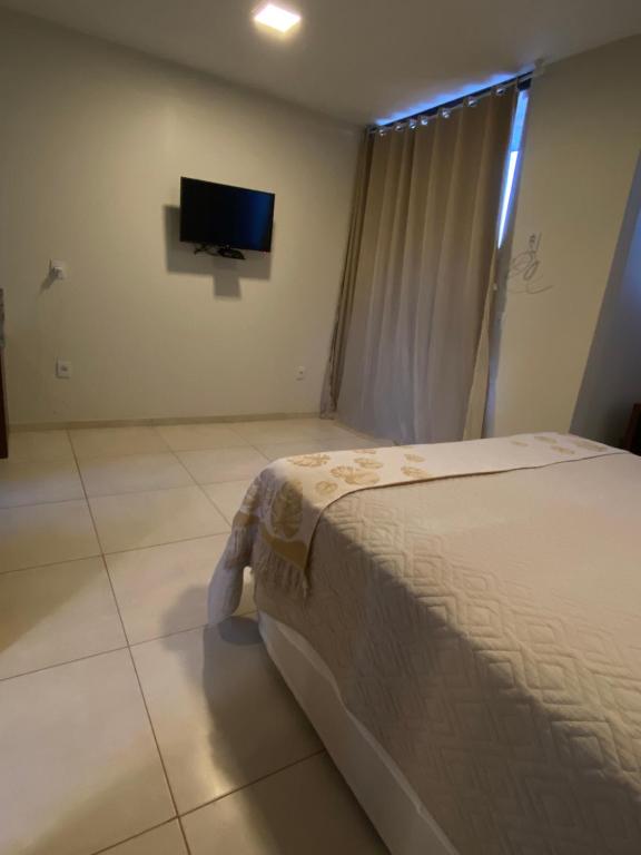 Postel nebo postele na pokoji v ubytování Delú Residences