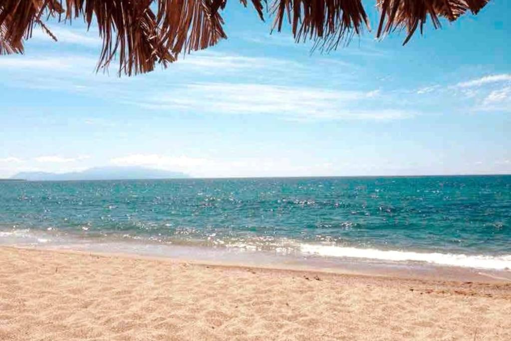 a beach with a view of the ocean at Seas the Day in Preveza