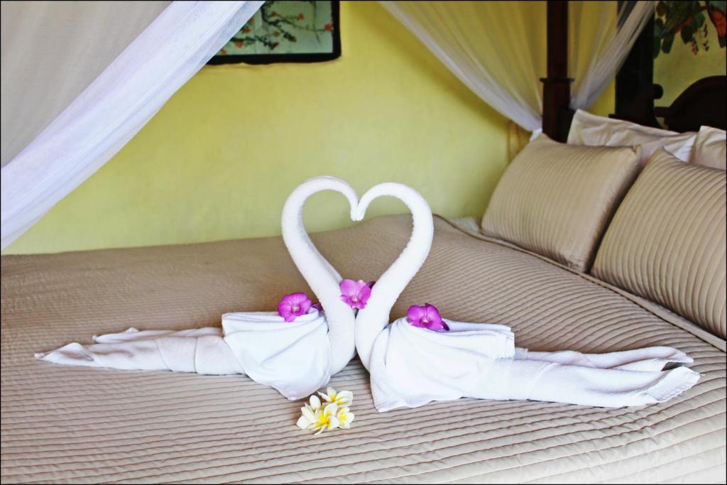 Postel nebo postele na pokoji v ubytování Pai Vimaan Resort