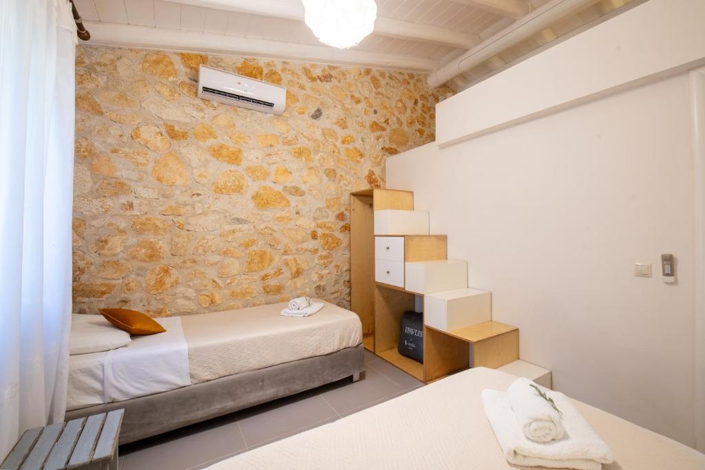 Postel nebo postele na pokoji v ubytování Piccolo Paradiso