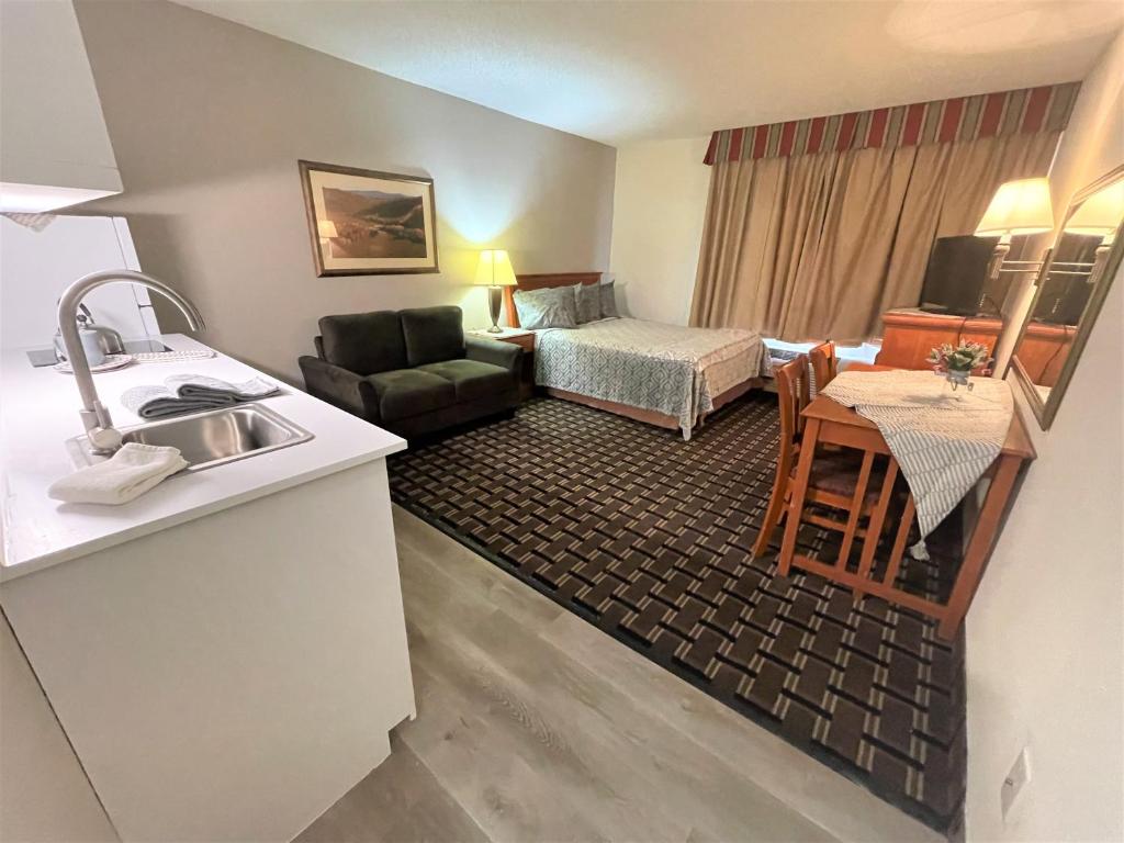 FairBridge Extended Stay, a Kitchenette Hotel - Estudio Con Cama Grande