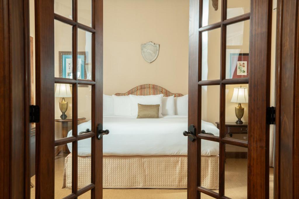 Postel nebo postele na pokoji v ubytování Hotel Viata