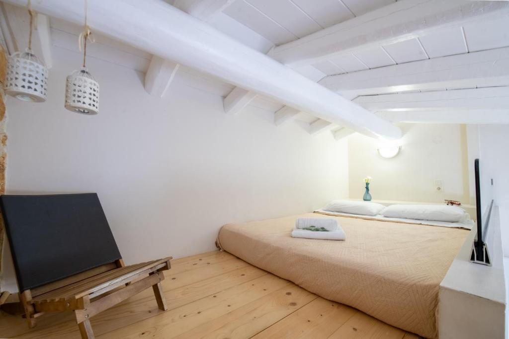 Postel nebo postele na pokoji v ubytování Piccolo Paradiso