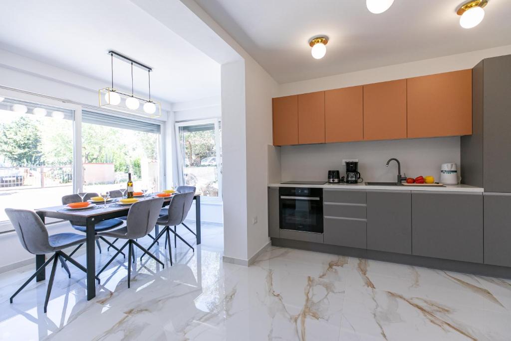 Kuchyň nebo kuchyňský kout v ubytování Apartman Suzi