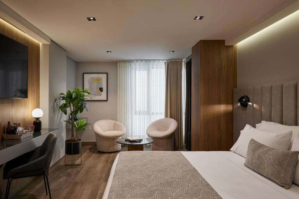 Uma cama ou camas num quarto em Hotel Selis