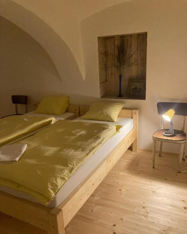 Postel nebo postele na pokoji v ubytování Ubytování NAPOLI