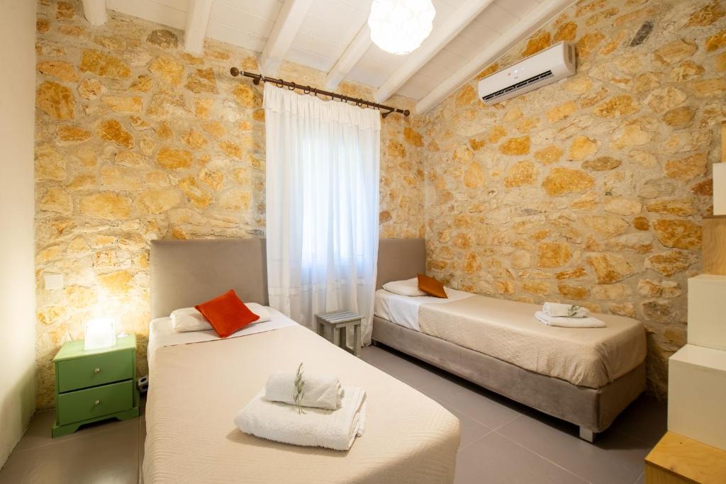 Postel nebo postele na pokoji v ubytování Piccolo Paradiso