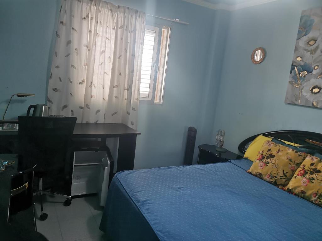 Postel nebo postele na pokoji v ubytování Habitación con baño privado