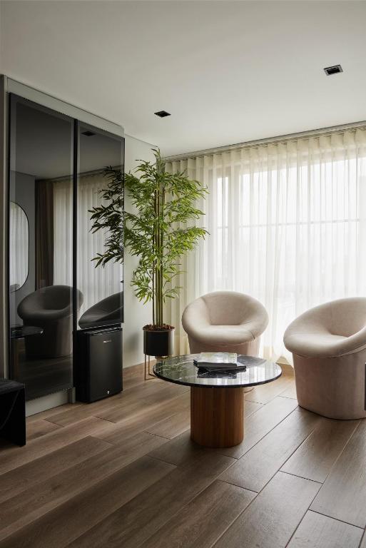 Uma área de estar em Hotel Selis