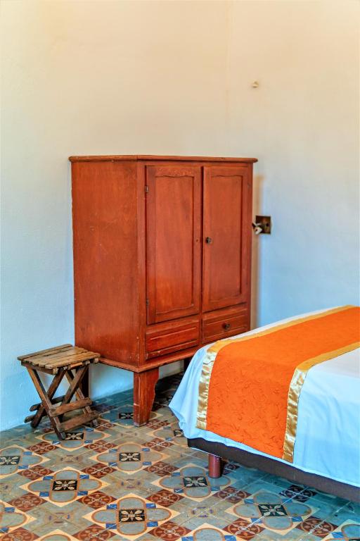 Postel nebo postele na pokoji v ubytování Hotel Gran Centenario