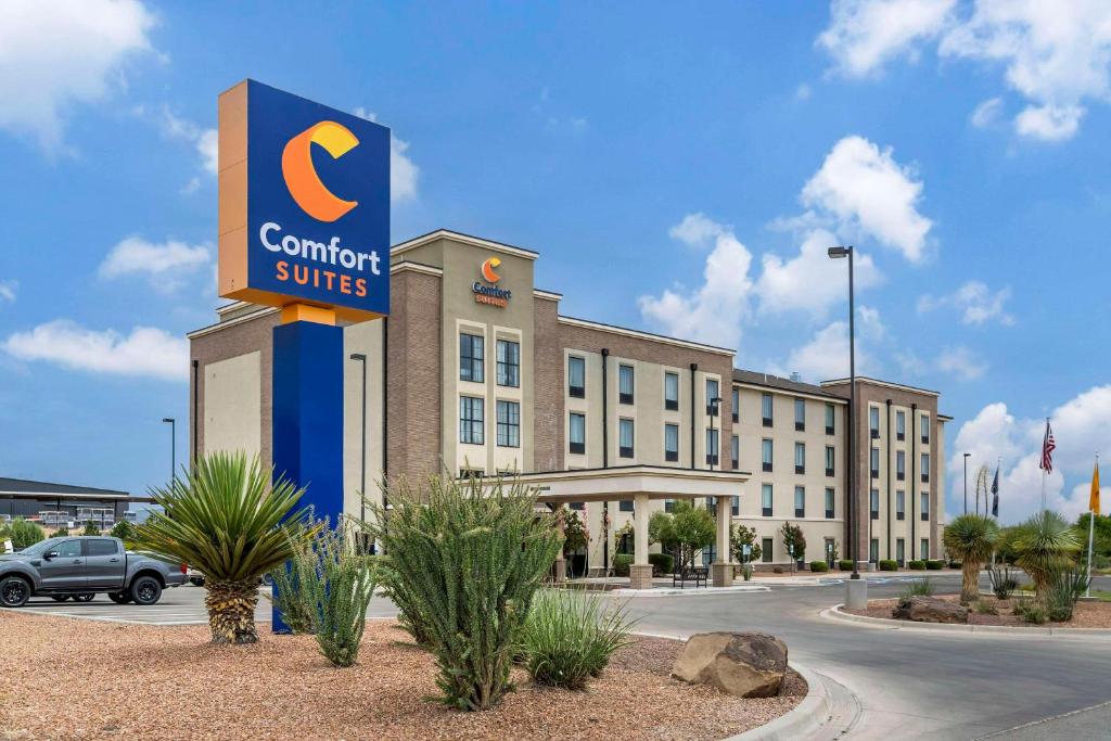 a building with a c comfort suites sign in front of it at Comfort Suites Carlsbad in Carlsbad