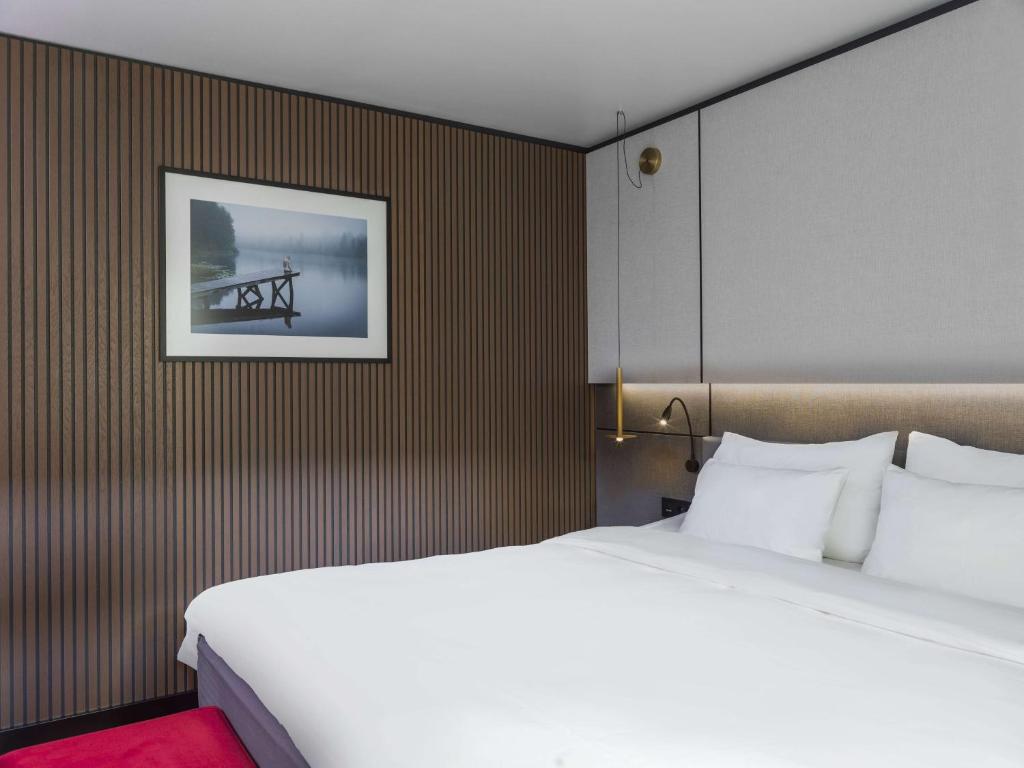 Postel nebo postele na pokoji v ubytování Radisson Blu Royal Viking Hotel, Stockholm