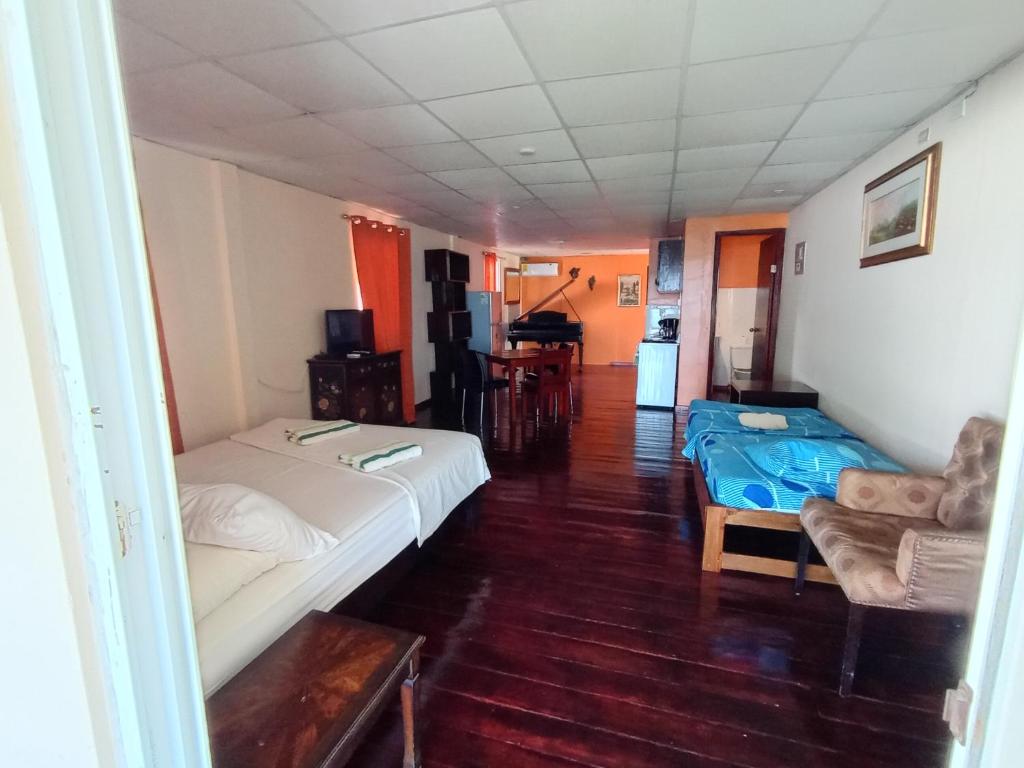 Postel nebo postele na pokoji v ubytování Sun Havens Apartments & Suites