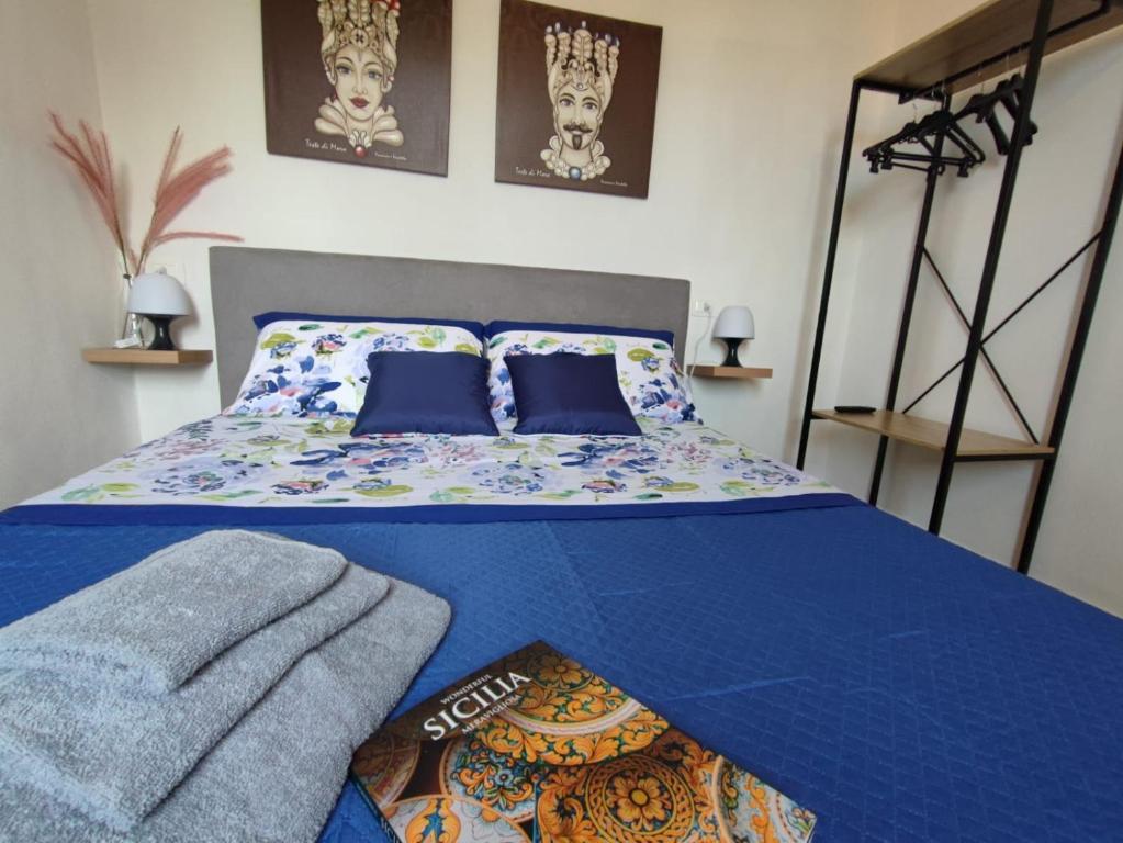 Postel nebo postele na pokoji v ubytování La casetta degli ulivi