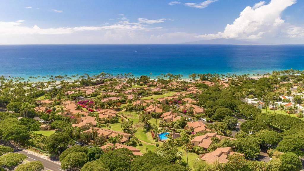 an aerial view of a resort with the ocean at Wailea Ekahi Village - CoralTree Residence Collection in Wailea