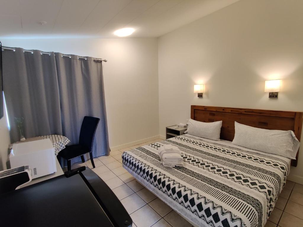 Posteľ alebo postele v izbe v ubytovaní Destination Inn Cache Creek