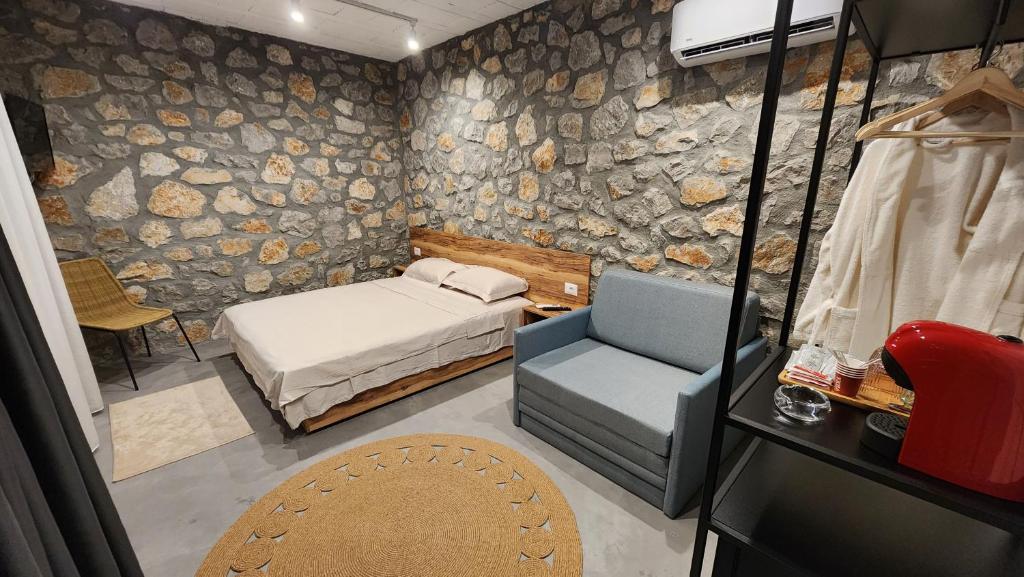 Postel nebo postele na pokoji v ubytování RUSTICO