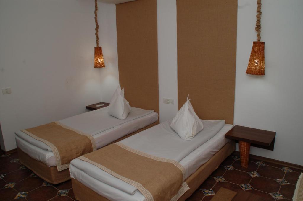 Postel nebo postele na pokoji v ubytování Hotel 2D Resort and Spa