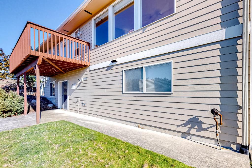 a house with a staircase on the side of it at La Cana Street Leisure - Main Home & In-Law suite in Coupeville