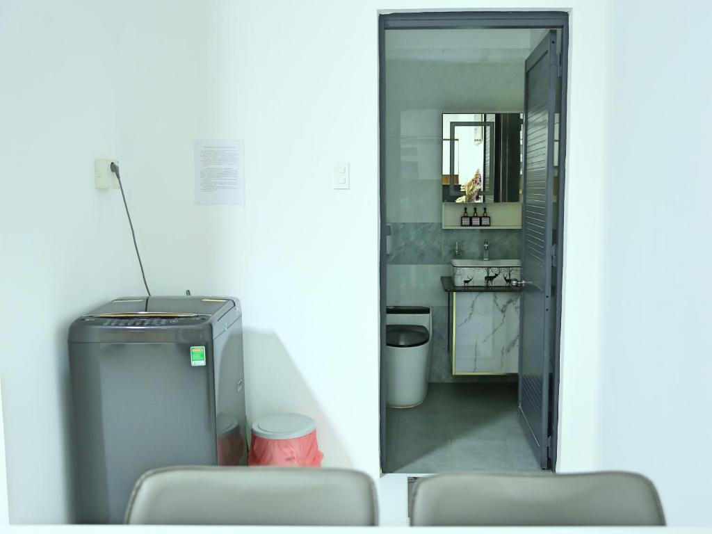 Kuchyň nebo kuchyňský kout v ubytování QV Manor Homestay