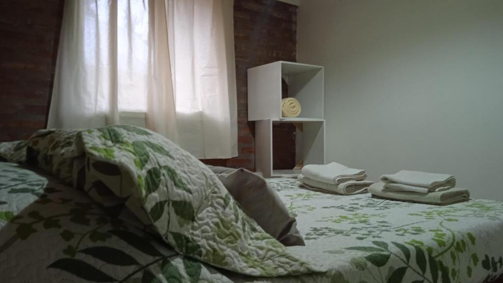 Postel nebo postele na pokoji v ubytování Cabaña Rayen
