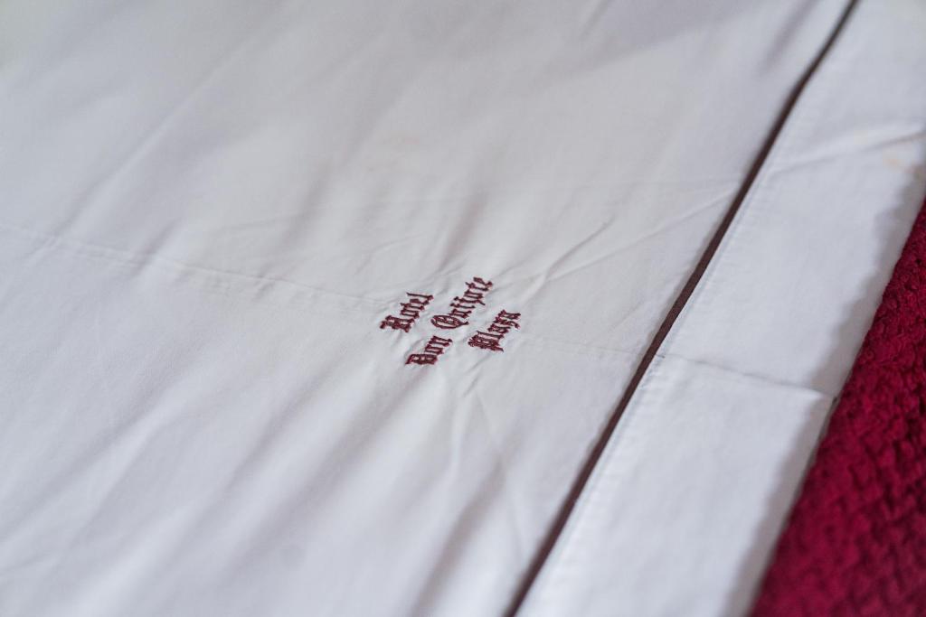 Postel nebo postele na pokoji v ubytování Hotel Don Quijote Plaza - Guadalajara Centro Historico