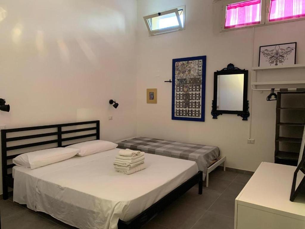 Letto o letti in una camera di Accomodation Libertino