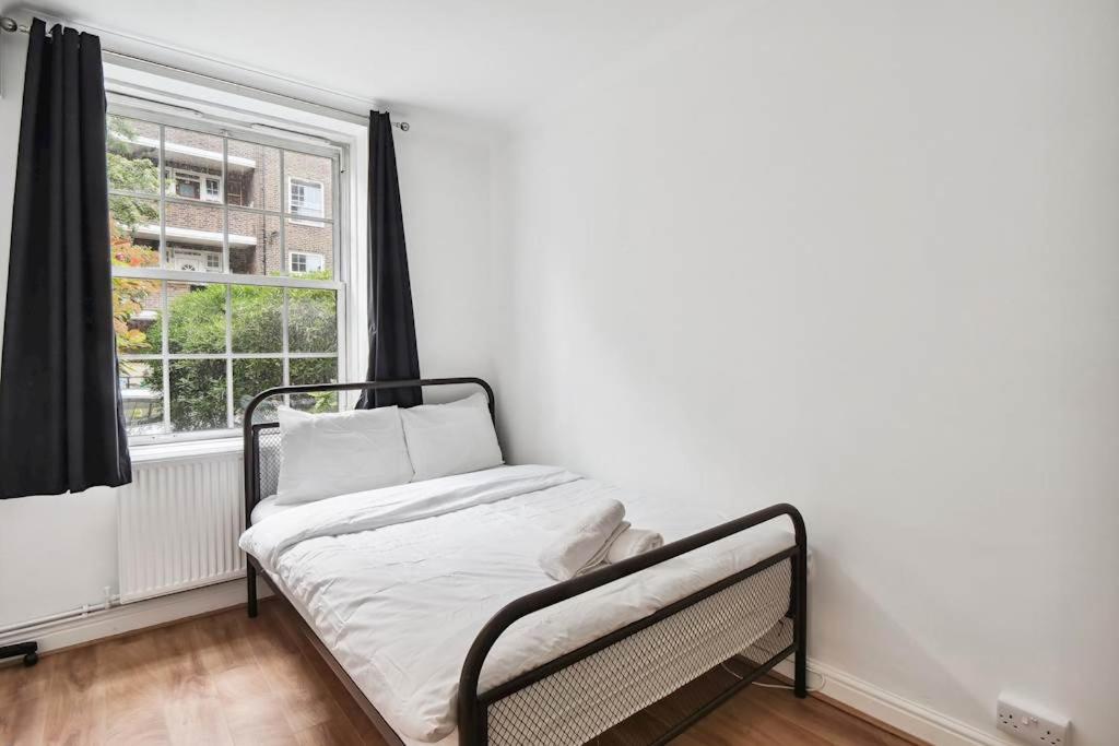 Voodi või voodid majutusasutuse APlaceToStay Central London Apartment, Waterloo toas