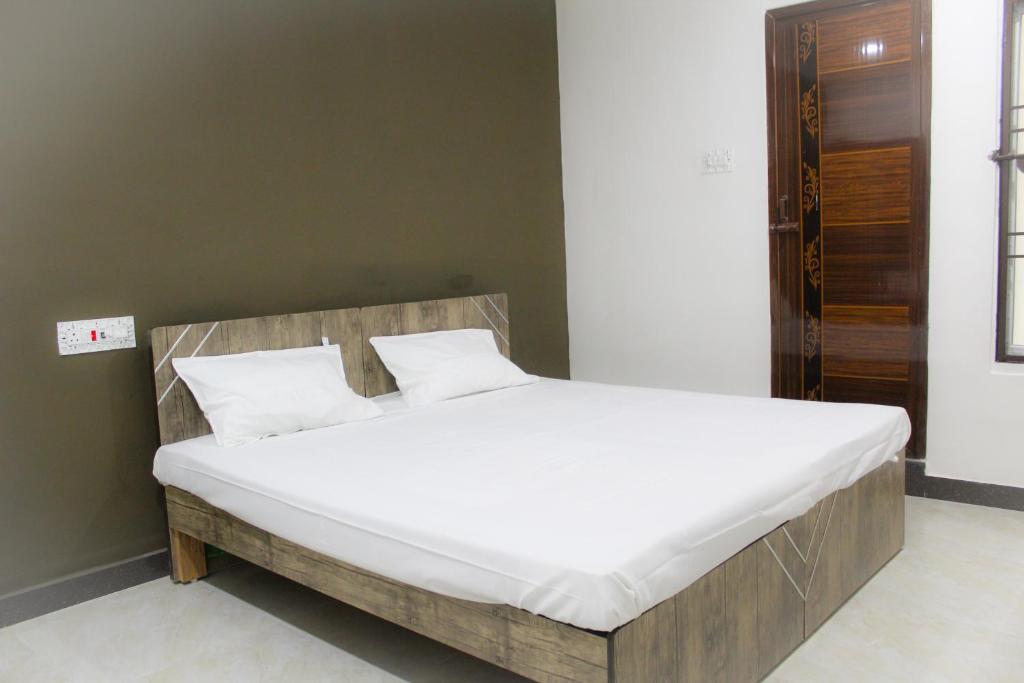 Postel nebo postele na pokoji v ubytování SAN BEACH RESIDENCY