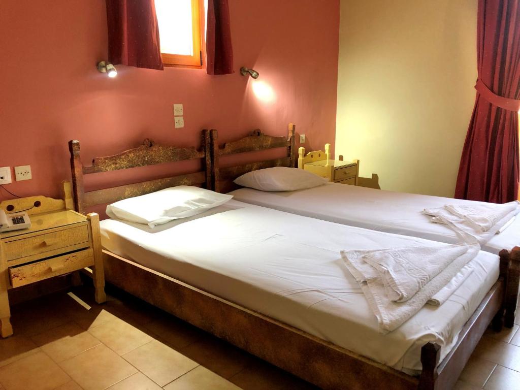 Postel nebo postele na pokoji v ubytování Lappa Hotel