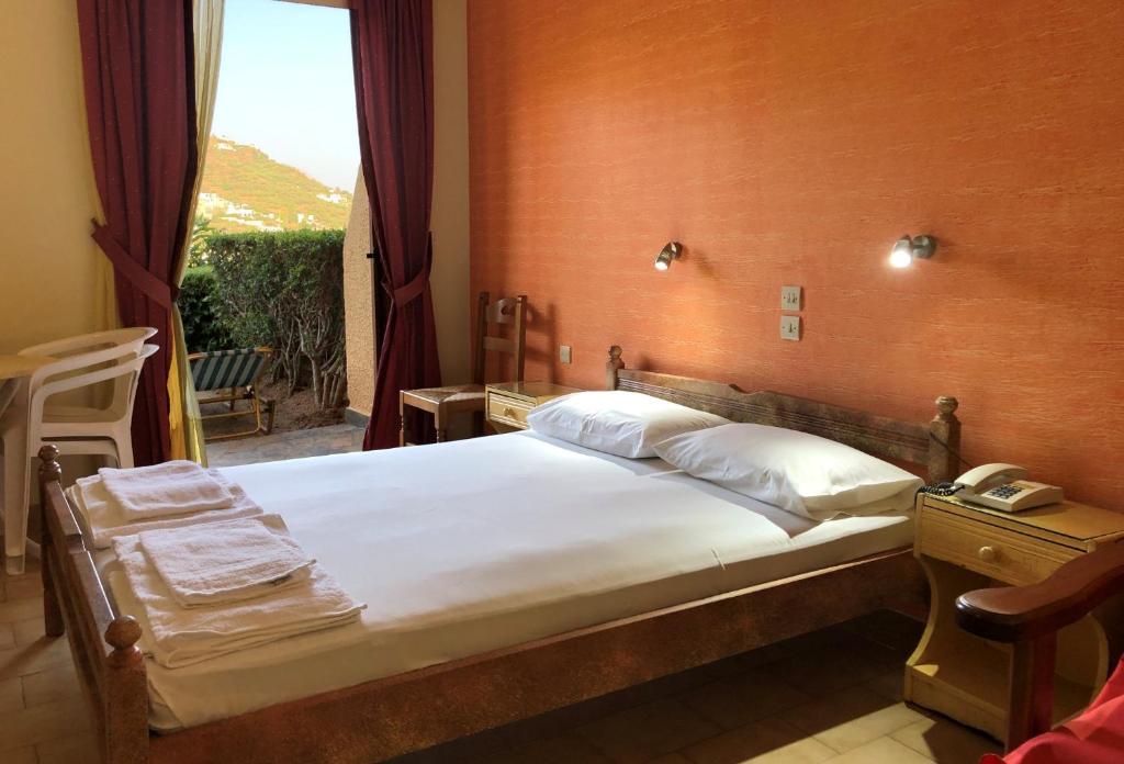 Postel nebo postele na pokoji v ubytování Lappa Hotel