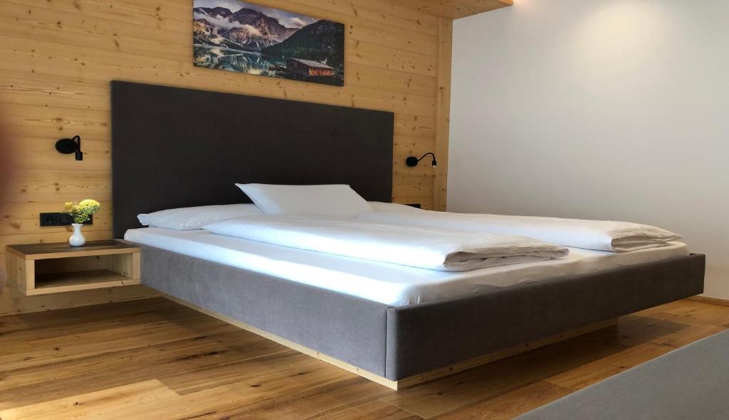 Postel nebo postele na pokoji v ubytování B&B Obermair