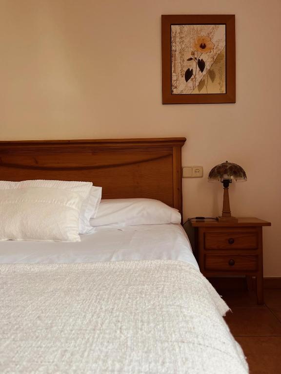 Postel nebo postele na pokoji v ubytování Casa Moline Apartamentos Rurales