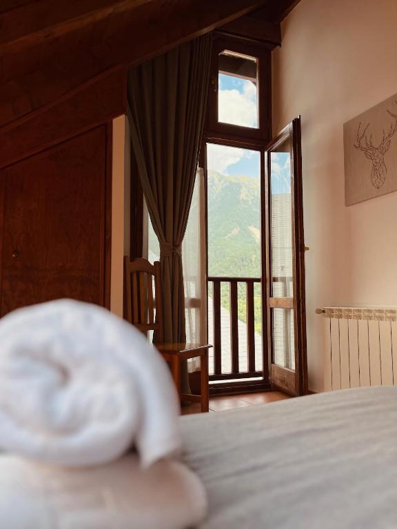 Postel nebo postele na pokoji v ubytování Casa Moline Apartamentos Rurales
