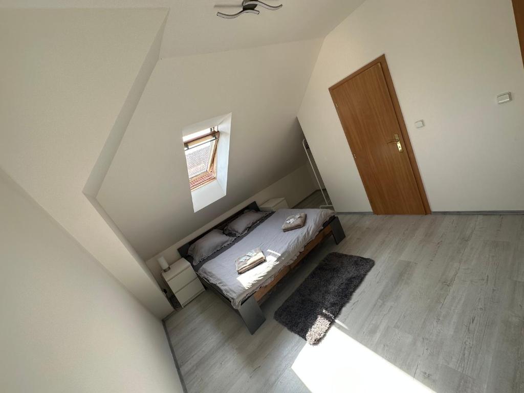 Postel nebo postele na pokoji v ubytování Penzion Arendel
