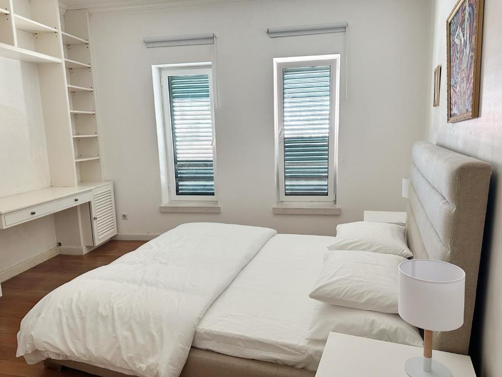 Postel nebo postele na pokoji v ubytování Yo-House