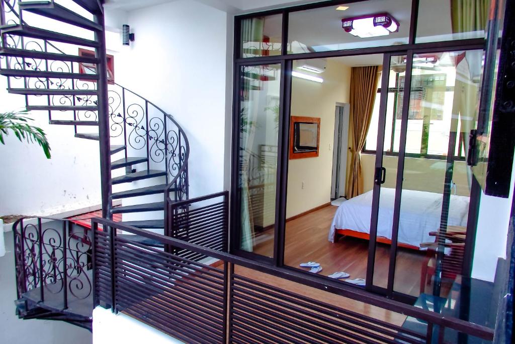 Postel nebo postele na pokoji v ubytování Anh Family Homestay