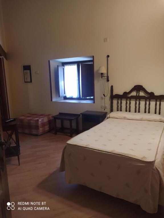 Postel nebo postele na pokoji v ubytování Hotel la posada de Numancia